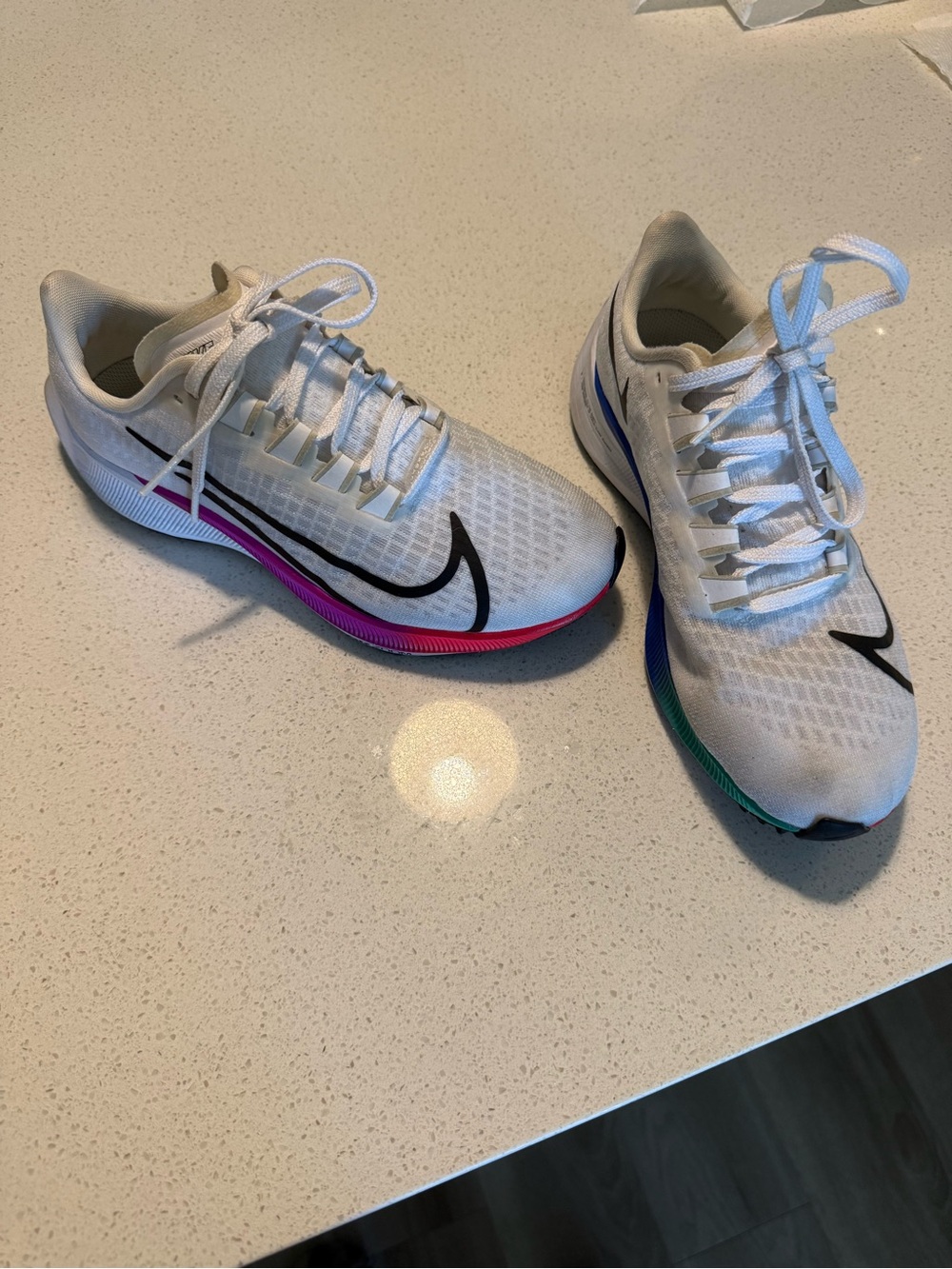Nike Women’s White Running Shoes with Black Swoosh and Rainbow Midsole